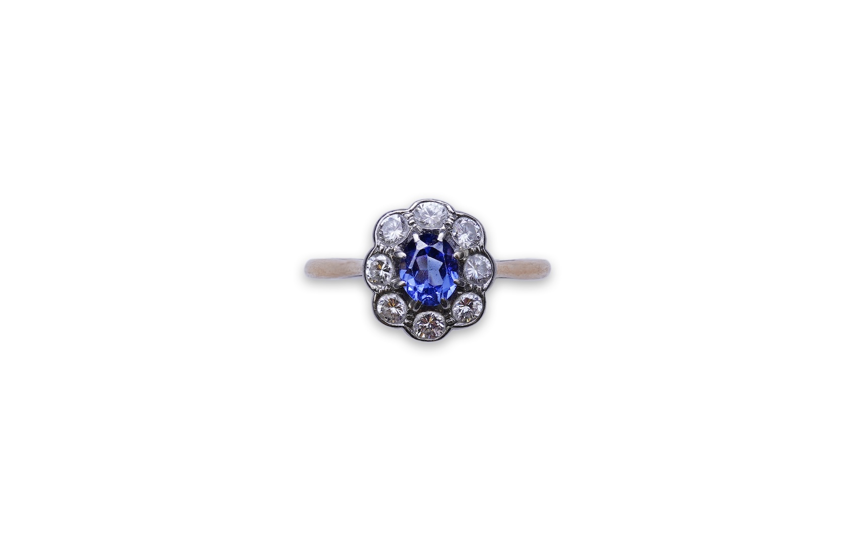 A synthetic sapphire and diamond ring